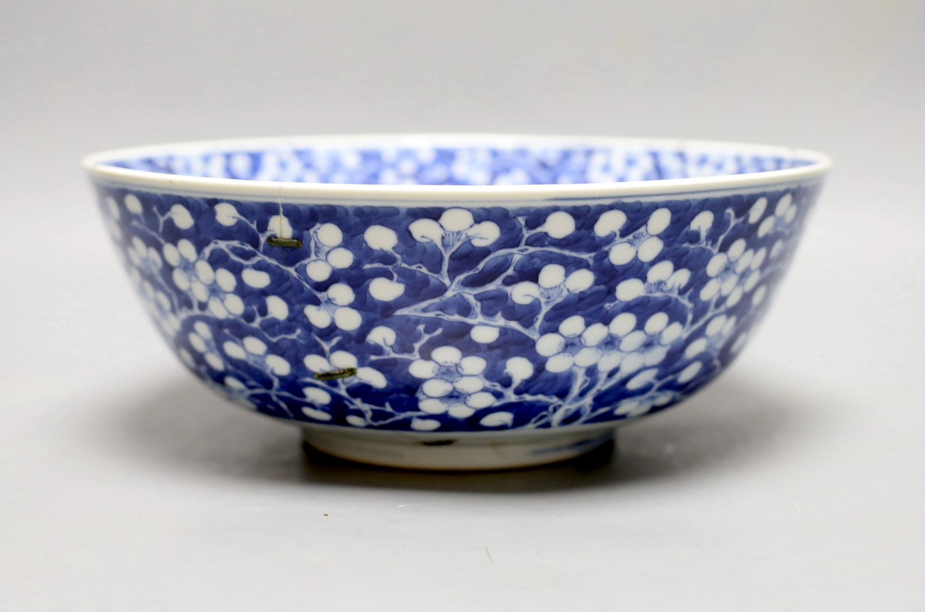 A Chinese blue and white bowl, 19th century. 26.5cm diameter